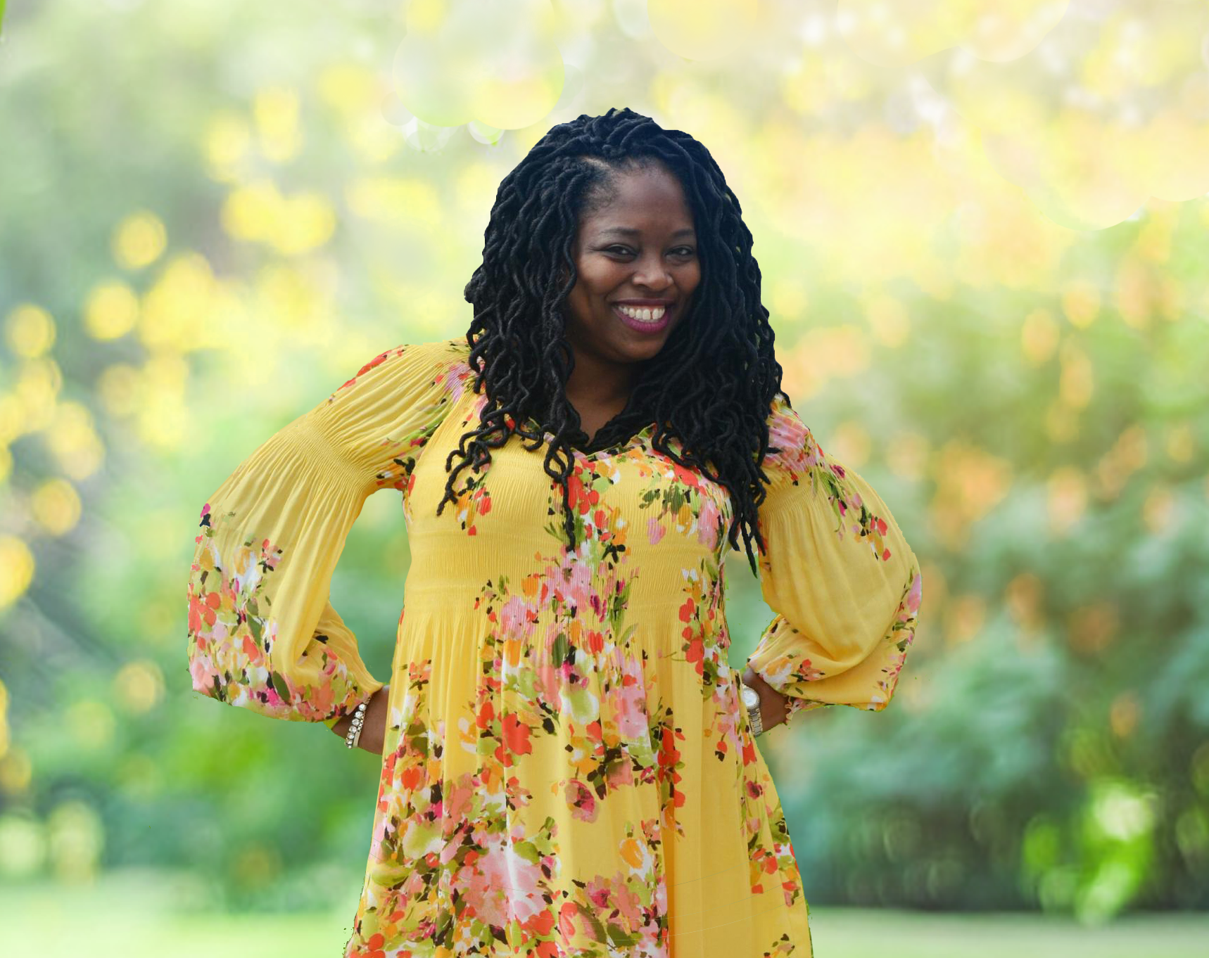 Carla Howard smiling at camera outside