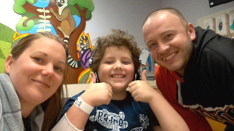 Neil Rininger with his wife and his son Derek