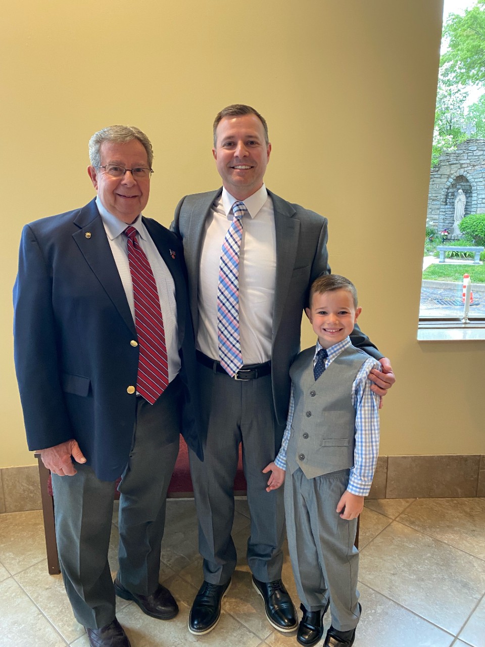 Blood donor Raymond Krimple with his son and grandson