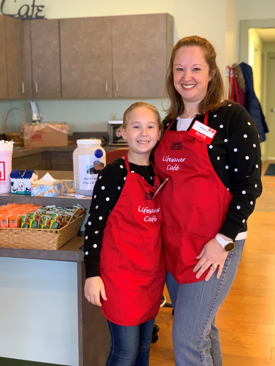 Livi and her mom Krista in Hoxworth aprons working at Hoxworth Blue Ash